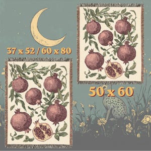 May include: Two woven throw blankets featuring a botanical pomegranate pattern with green leaves and deep red fruit on a cream background. The text 37 x 52 / 60 x 80 and 50 x 60 is displayed in orange, alongside a yellow crescent moon illustration.
