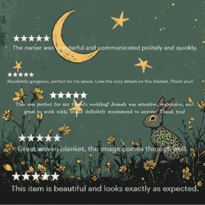 May include: A dark green woven blanket with a whimsical design featuring a crescent moon, stars, flowers, and a rabbit. The blanket has text that reads, "This item is beautiful and looks exactly as expected."