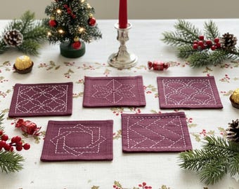 Juego completo de posavasos sashiko rojo para hacer tú mismo con tela preimpresa, entretela, tela impermeable, hilo blanco, aguja e instrucciones completas.