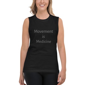 May include: Black sleeveless muscle tank top with the text "Movement is Medicine" in gray lettering.