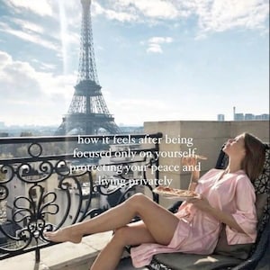 May include: A woman in a pink robe sits on a balcony overlooking the Eiffel Tower in Paris, France. The text "how it feels after being focused only on yourself, protecting your peace and living privately" is superimposed on the image.