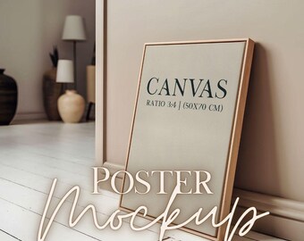 May include: A beige canvas poster mockup with a wooden frame, leaning against a wall. The poster has the text "CANVAS RATIO 3:4 | (50X70 CM)" printed on it. The poster is on a white wooden floor.