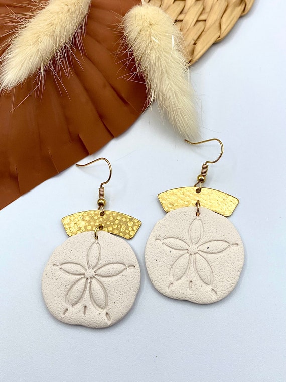 Sand dollar hotsell dangle earrings