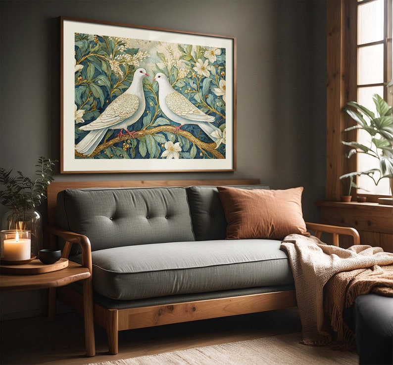 May include: A framed print of two white doves perched on a branch with green leaves and white flowers. The doves are facing each other and have their wings spread out.