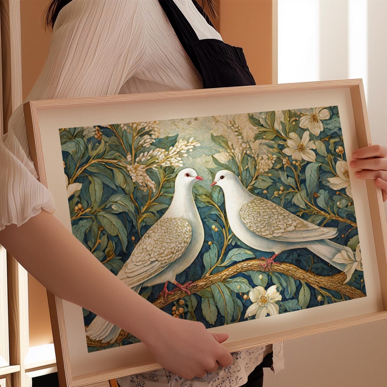 May include: A framed print of two white doves perched on a branch in a lush green garden setting. The doves are depicted in a realistic style with intricate details. The background features a variety of foliage and flowers, creating a sense of tranquility and beauty.