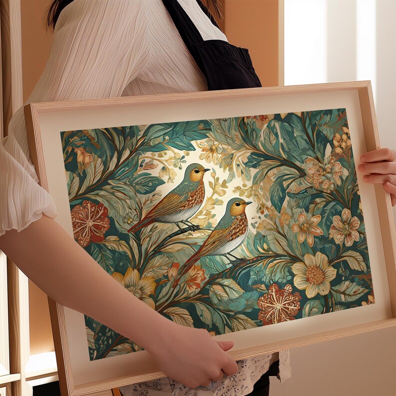 May include: A framed print featuring a whimsical floral design with two birds perched on branches. The birds are depicted in shades of blue, green, and yellow, while the flowers are in shades of pink, yellow, and orange. The background is a rich teal color.