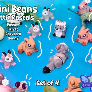 Puede incluir: Colección de figuras de animales en miniatura, incluyendo una zarigüeya, un hurón, un carpincho y un conejo, dispuestas sobre una superficie azul. Las figuras son de varios colores, con el texto "Mini Beans Little Rascals" y "Set of 4!" visible.