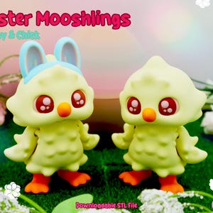 May include: Two Easter-themed figurines: a bunny and a chick. The bunny has blue ears and the chick has a yellow body. Both have large red eyes, orange beaks, and orange feet. The text "Easter Mooshlings" and "Bunny & Chick" are displayed above the figurines.