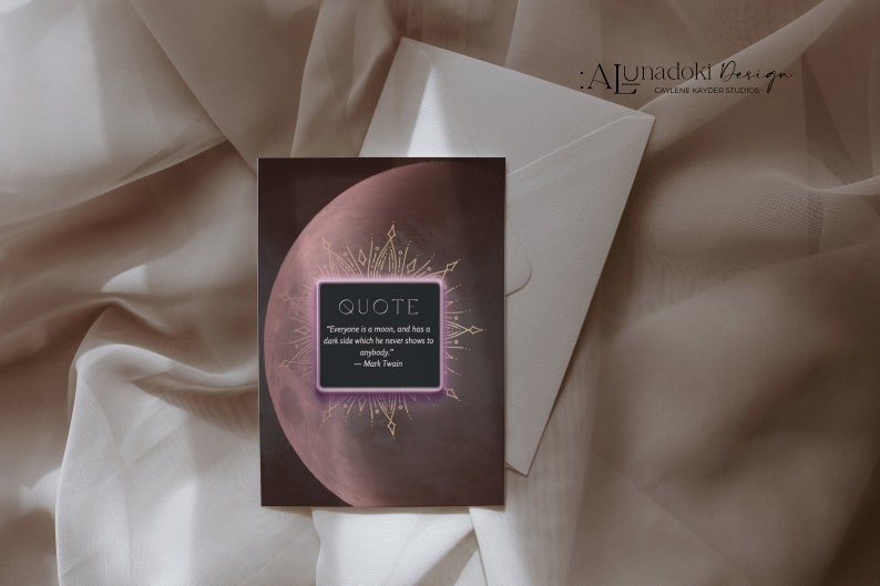 May include: A dark brown card with a pink moon and gold accents. The card features a quote by Mark Twain: "Everyone is a moon, and has a dark side which he never shows to anybody."