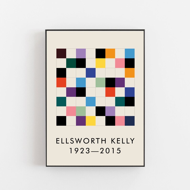 May include: A black and white framed print with a colorful geometric pattern and the text "ELLSWORTH KELLY 1923-2015".