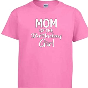 May include: Pink t-shirt with white text that reads "Mom of the Birthday Girl".