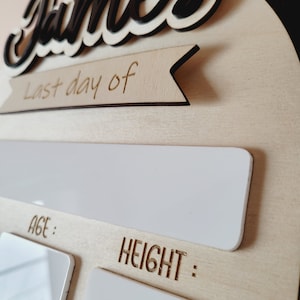 Close-up of reusable first day of school sign showing name, grade, age and height sections