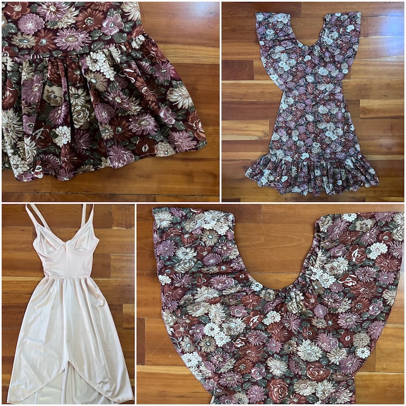 May include: Four floral print dresses in various styles and colors. The dresses are laid out on a wooden surface.
