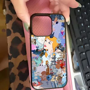May include: Black phone case featuring a collage of Cinderella-themed illustrations. The design includes Cinderella, birds, and other characters in a blue, pink, and white color scheme. The text "I told the Stars about You" is visible.