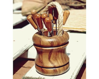 Support for chopsticks and 12 skewers in the shape of a well made of olive wood