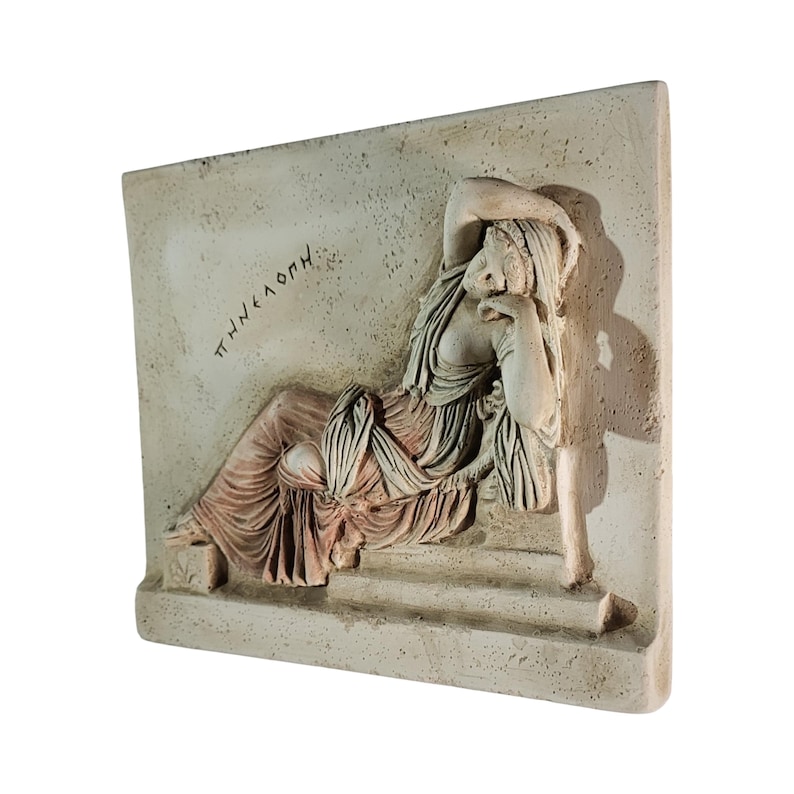 May include: A rectangular, off-white relief sculpture depicting a reclining figure in classical attire. The figure is draped in flowing robes, with one arm supporting the head. The Greek word "&Pi;&Eta;&Nu;&Epsilon;&Lambda;&Omicron;&Pi;&Eta;" is inscribed on the upper left. The sculpture has a weathered appearance.