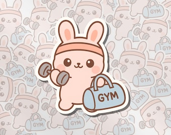 Kawaii Gym Kanin-klistermärke | Sött Träningsdjur med Hantel och Väska | Fitnessälskare-klistermärke | Laptopdekal med Vattenflaska | 5 cm Vinyl