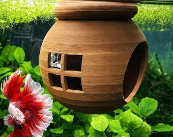 Drijvend Betta-huis. Drijvende betta-schuilplaats in het aquarium. Drijvend huis voor Betta. Aquarium Betta-hangmat om te ontspannen en te ontdekken.