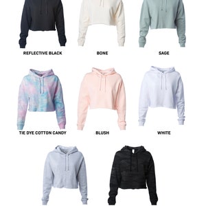 May include: Nine cropped hoodies in various colors and patterns, including reflective black, bone, sage, tie dye cotton candy, blush, white, grey heather, and black camo.