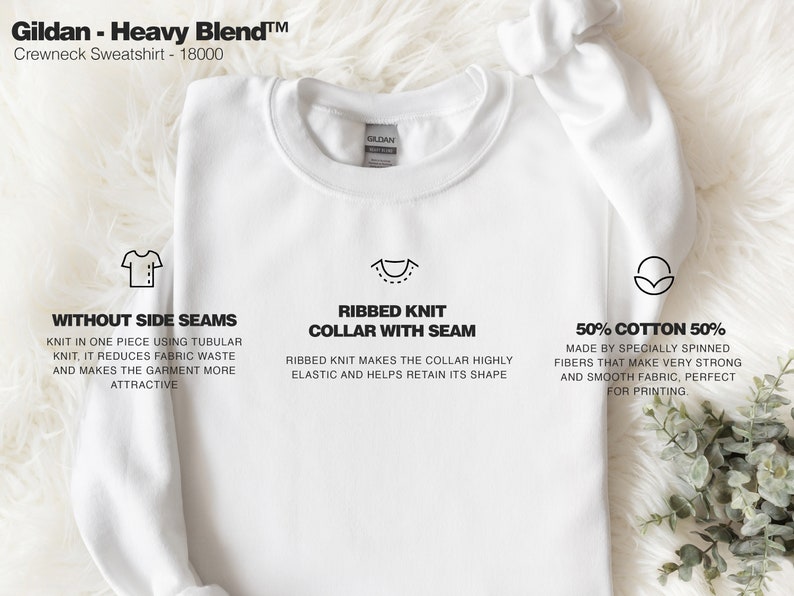 May include: A white Gildan Heavy Blend crewneck sweatshirt with a ribbed knit collar and side seams. The text "Gildan - Heavy Blend&trade; Crewneck Sweatshirt - 18000" is printed at the top of the image. The text "WITHOUT SIDE SEAMS", "RIBBED KNIT COLLAR WITH SEAM", and "50% COTTON 50%" is printed below the image of the sweatshirt.