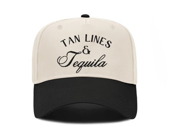 May include: A white and black baseball cap with the text "Tan Lines & Tequila" embroidered on the front.