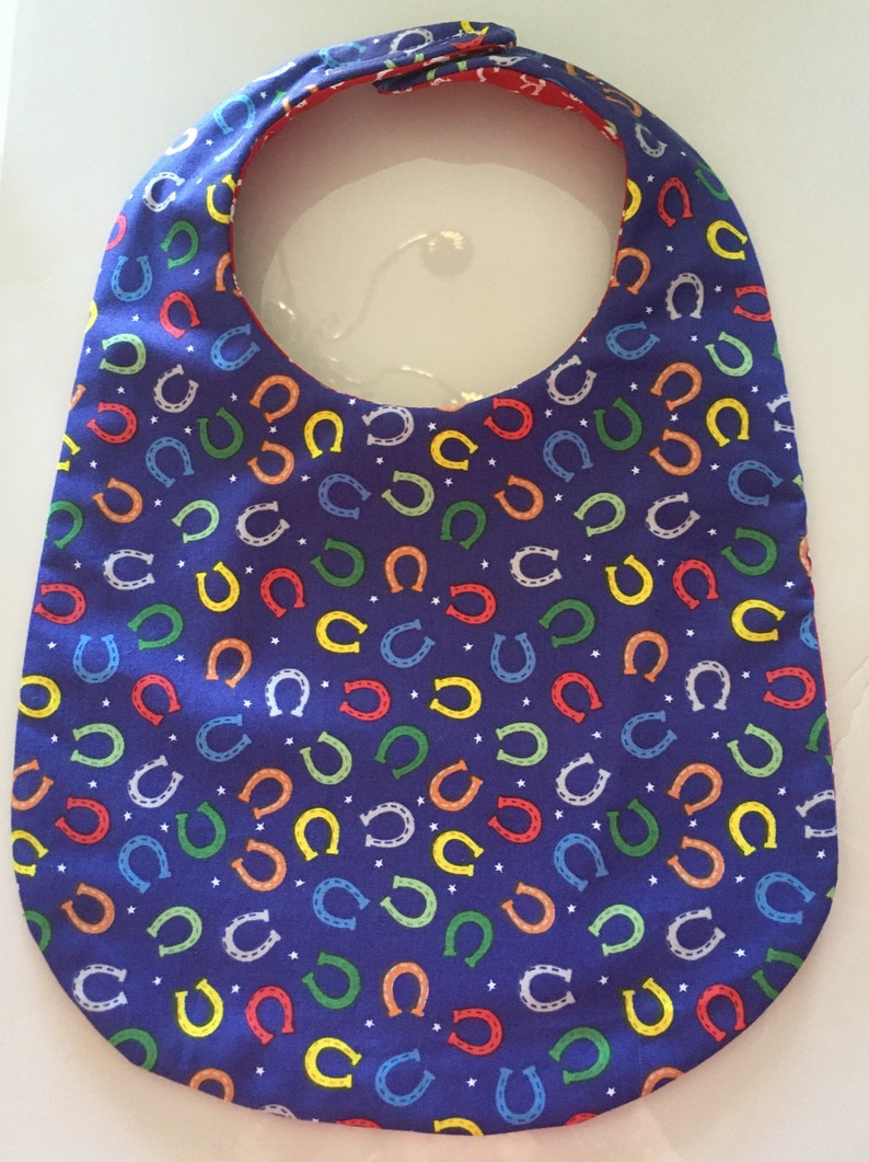 Reversible RedBlue Horseshoes Bib