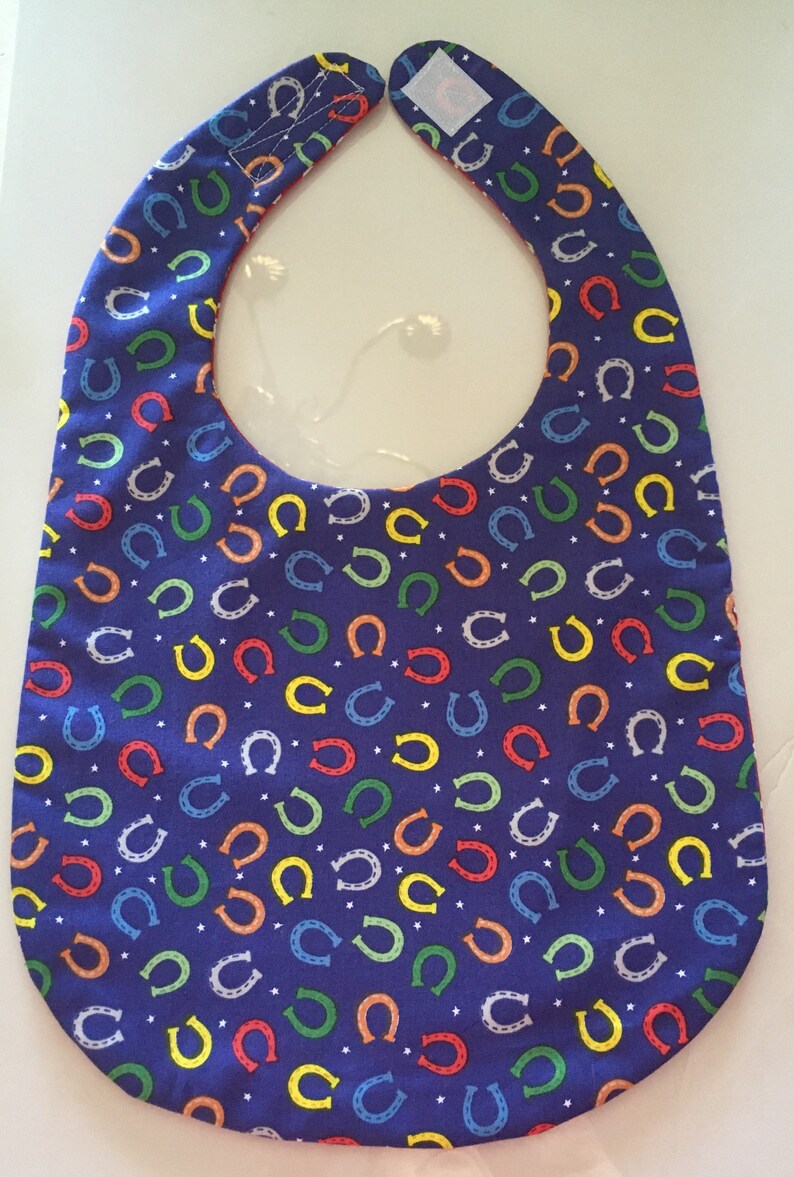 Reversible RedBlue Horseshoes Bib