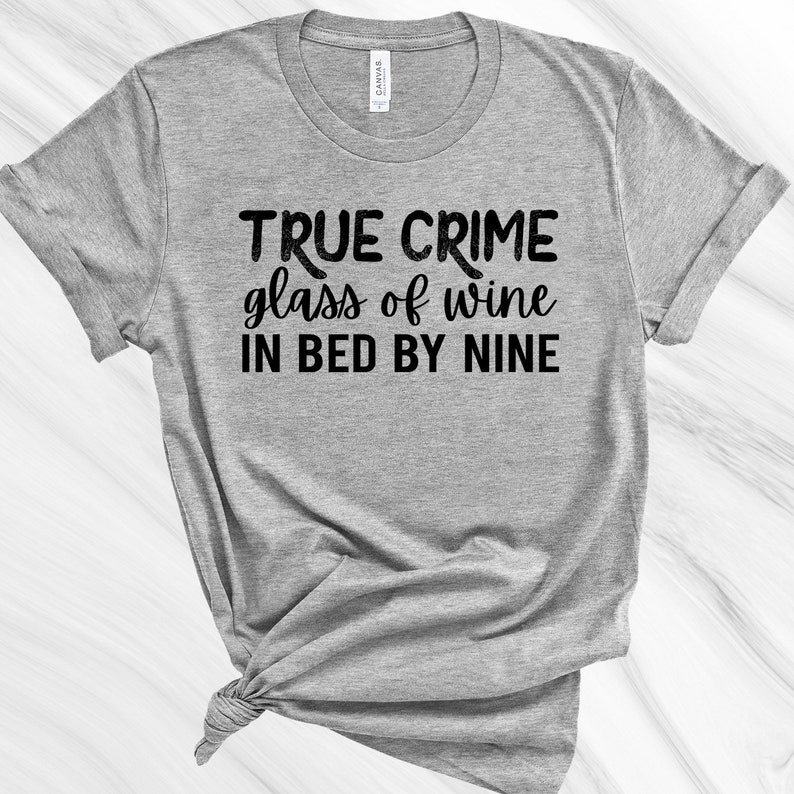 true crime glass of wine in bed by nine shirt