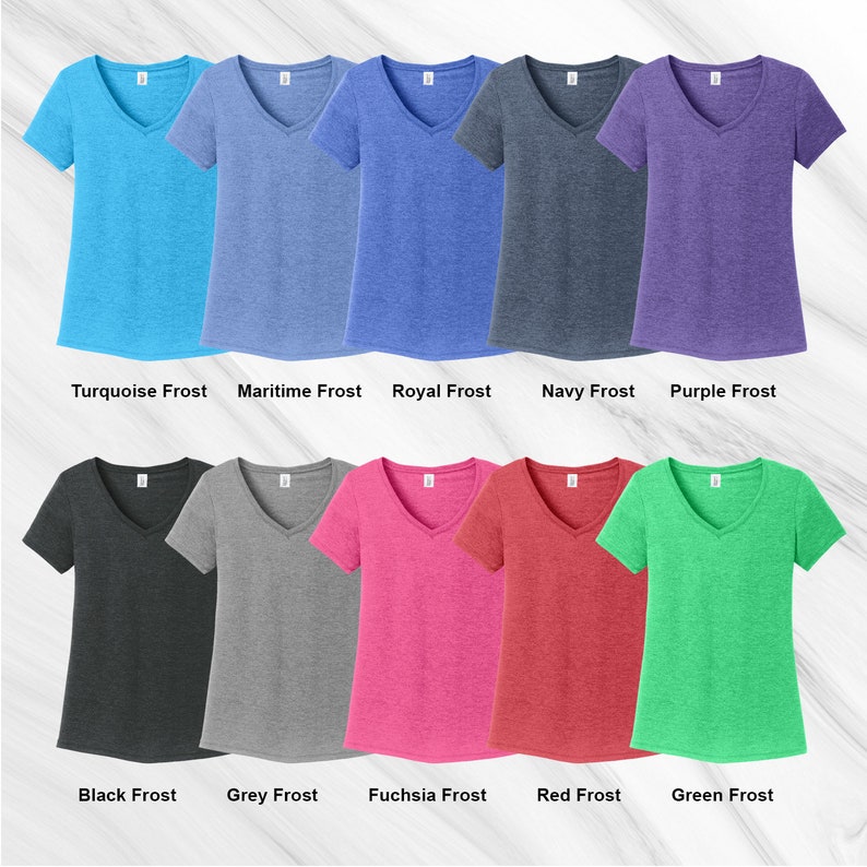 May include: Ten different colors of V-neck t-shirts, including turquoise, maritime, royal, navy, purple, black, grey, fuchsia, red, and green.