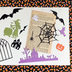 May include: A collection of 12 Halloween-themed paper diecuts, including witches, a cauldron, a spider web, a haunted house, a bats, a pumpkin, ghost, and a graveyard scene.