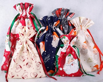 Papel de regalo navideño reutilizable con cordón, tela ecológica, ideal para regalos, sacos navideños o intercambios de regalos de amigo invisible.