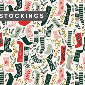 May include: A repeating pattern on a cream background featuring various holiday stockings in red, dark green, and light pink, interspersed with sprigs of pine, holly berries, and leaves. The word STOCKINGS is printed in white text.