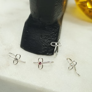 Infinity nep piercings, nep neusring, neusmanchet, nep neusring, nep neusring, nep neusgatring, neussieraden geen piercing nodig