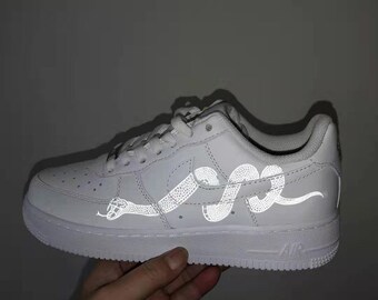 shoes with snakes on them