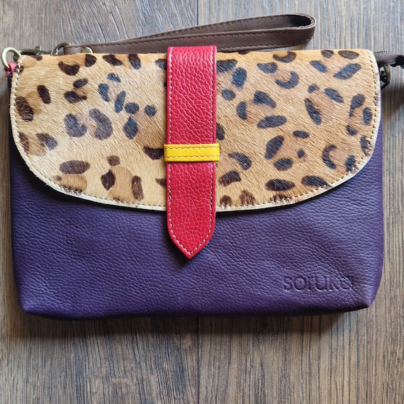 Magnifique pochette bandoulière en cuir de Soruka, violet avec