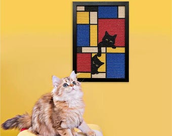 May include: A fluffy, multi-colored cat sits on a patchwork cushion, gazing upwards. A framed artwork with a Mondrian-style design in red, blue, yellow, and black, featuring black cat silhouettes, hangs on a yellow wall.