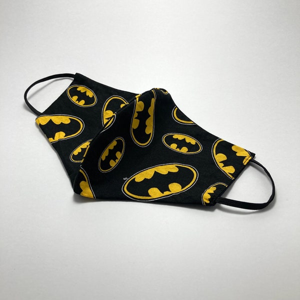 Reusable and reversible Batman face mask with filter included. Made by an experienced tailor! Fun character pattern for work/everyday wear!