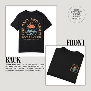 May include: Black t-shirt with a graphic print of a sunset and the text "The Salt and Light Social Club" with the scripture reference "Matthew 5:13-16".