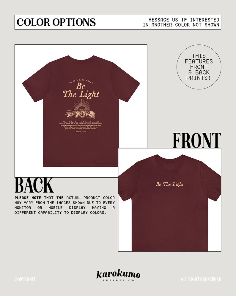 May include: Burgundy t-shirt with a graphic print of a mountain range and the text "In this dark world, Be the light." on the back and the text "Be the light" on the front.