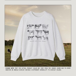 May include: A heather grey sweatshirt with a graphic of cows and the text "support your local farmer".