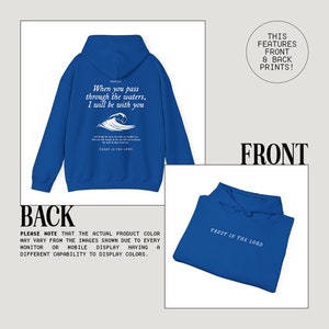 May include: A royal blue hoodie with a white wave graphic and the text "When you pass through the waters, I will be with you" and "Trust in the Lord". The back of the hoodie has the text "Trust in the Lord" in white.