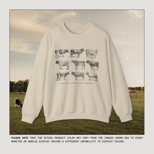 May include: A beige sweatshirt with a graphic print of cows and the text "support your local farmer."