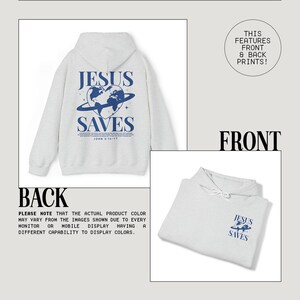 May include: A grey hooded sweatshirt with a blue graphic print on the front and back. The front print says "Jesus Saves" with a globe and a heart. The back print says "Jesus Saves" with a globe and a heart. The text "John 3:16-17" is printed below the graphic on the back.