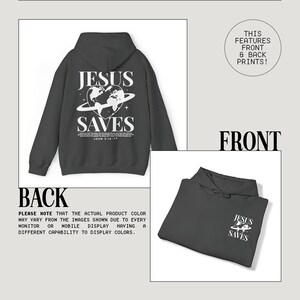 May include: A charcoal grey hooded sweatshirt with a white graphic print on the front and back. The front print says "Jesus Saves" with a globe and stars. The back print says "Jesus Saves" with a globe, stars, and the scripture reference "John 3:16-17".