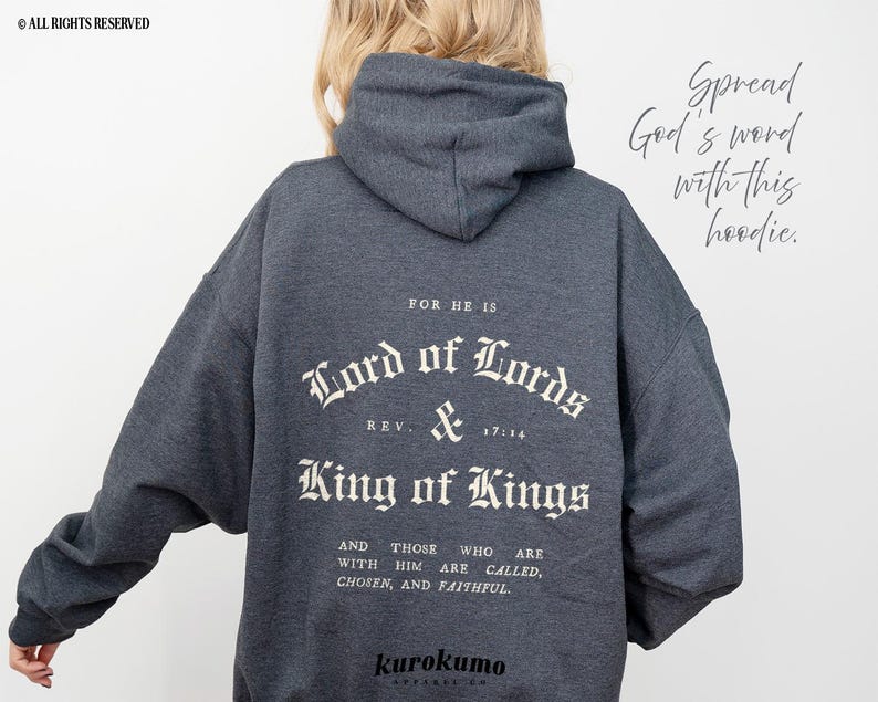 May include: Gray hooded sweatshirt with the text "FOR HE IS Lord of Lords REV & 17:14 King of Kings AND THOSE WHO ARE WITH HIM ARE CALLED, CHOSEN, AND FAITHFUL." printed on the back. The text is in a white, gothic font.