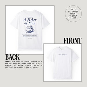 May include: White t-shirt with a blue and black graphic print on the back that says "Jesus Made Me A Fisher of Man" and a smaller print of a fish with water droplets. The front of the shirt has a smaller blue print that says "I Catch & He Cleans".