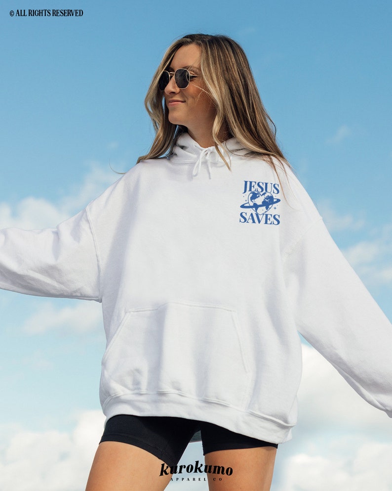 May include: White hooded sweatshirt with a blue graphic of a globe with the text "JESUS SAVES" on it.