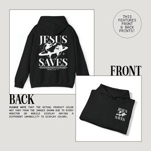 May include: Black hooded sweatshirt with a white graphic print of a globe with a heart and the words "Jesus Saves" and "John 3:16-17". The sweatshirt has a front and back print.