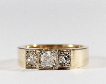 Beautiful ring with three diamonds 0,91 ct