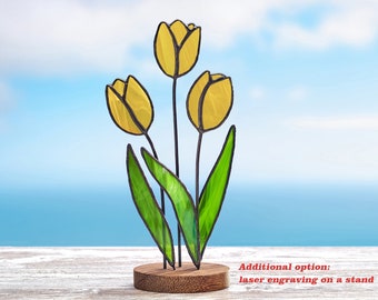 Stained glass Yellow tulips on the wooden stand Stained glass  suncatcher Flower decoration.